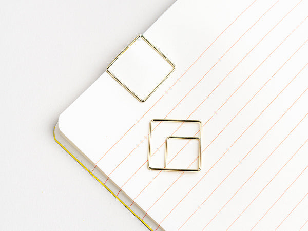 אטבי נייר גיאומטריים בצנצנת – 50 יח'